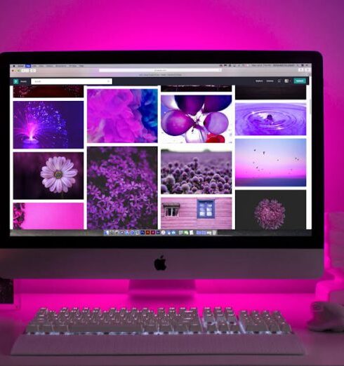 Websites - Silver Imac Displaying Collage Photos