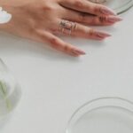 Tips - Unrecognizable Female Hands Preparing Chemical Reaction on White Table