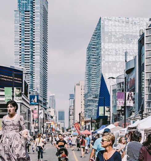 Tips - People in the Middle of the Street Under Blue Cloudy Skies