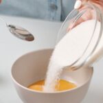 Meal Prep - Person Pouring Powdered Sugar in a Bowl