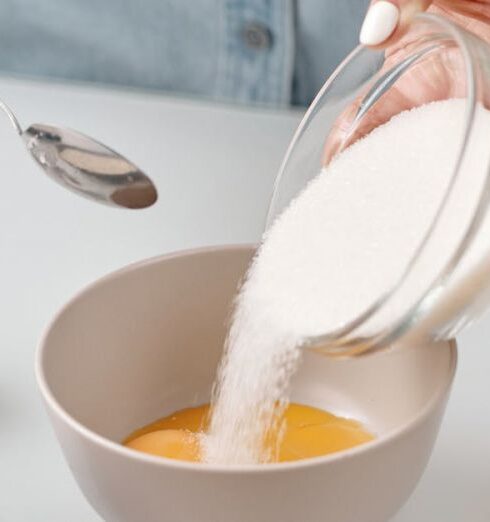 Meal Prep - Person Pouring Powdered Sugar in a Bowl