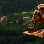 Meals - Woman Hands over Table with Breakfast