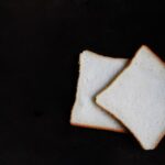 Diet - two slices of breads on top of black surface