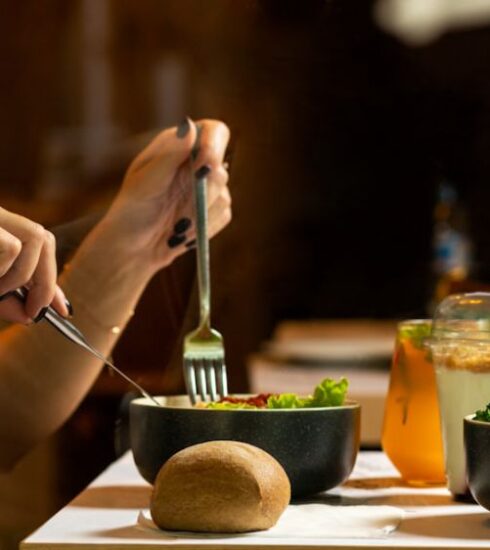 Diet - person holding silver fork and knife