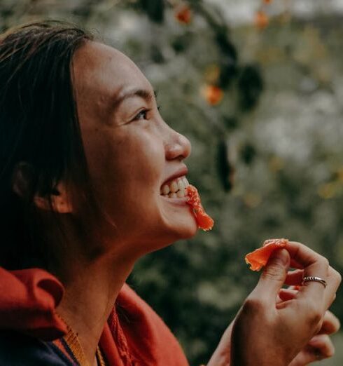 Eating - Woman Biting Red Fruit