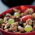 Muesli - Cooked Rice With Beans on Red Bowl