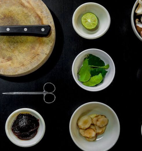 Cooking - Spices on Bowl Near Knife on Chopping Boad