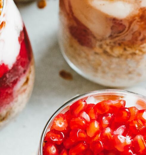 Muesli - White Ice Cream With Red and Black Berries on Top