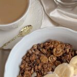 Muesli - Bowl of Cereals Beside a Cup of Hot Chocolate