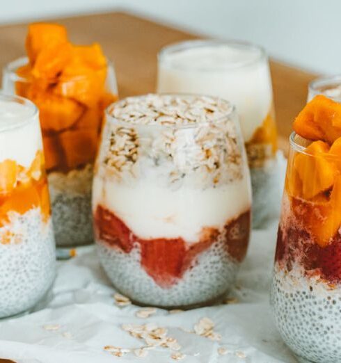 Muesli - Chia Seeds and Yoghurt Cream on Clear Glasses