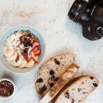 Muesli - Black Dslr Camera on White Surface