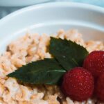 Muesli - Muesli in Bowls Topped with Raspberries