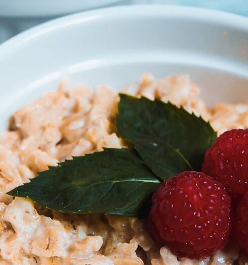 Muesli - Muesli in Bowls Topped with Raspberries