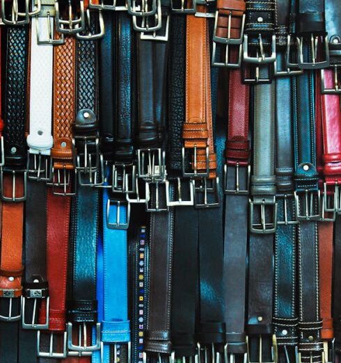 Belts - Shallow Focus Photography of Assorted-color Leather Belts