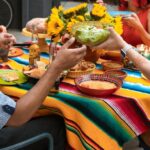 Foods - A Group of People Sitting on the Chair while Having Dinner