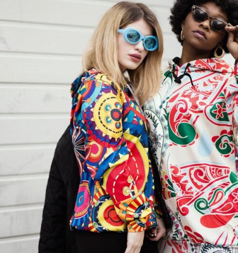 Hoodies - Two Women Standing Near Roller Shutter