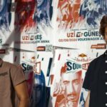 Bandanas - Two young men standing in front of a poster