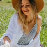 Foods - Women Sitting on a Picnic Blanket while Eating