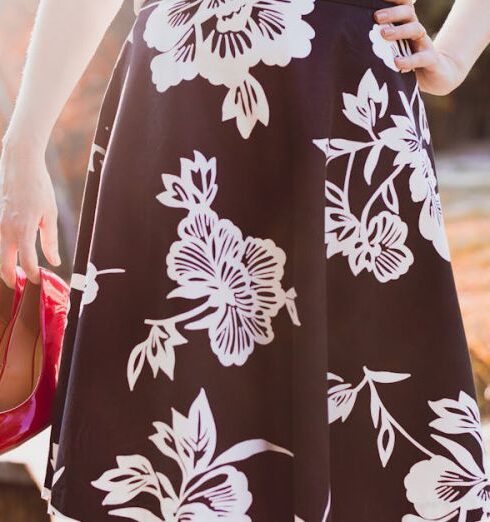 Skirts - Woman Wearing Skirt Holding Her Shoes