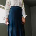 Skirts - Woman Wearing White Long-sleeved Shirt and Blue Skirt