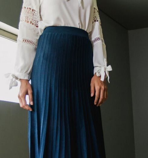 Skirts - Woman Wearing White Long-sleeved Shirt and Blue Skirt