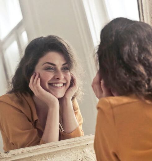 Look - Photo of Woman Looking at the Mirror