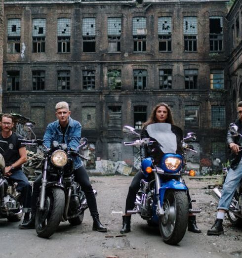 Leather Jackets - People Riding on Motorcycle Near Building