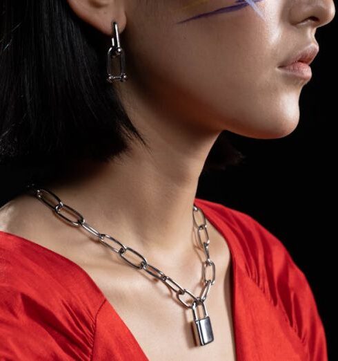 Jewelry - Woman with Face Paint Wearing a Silver Chain Necklace