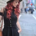 Jumpsuit - Photo of Woman Wearing Sun Hat While Looking Downward