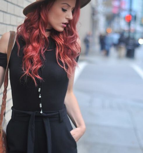 Jumpsuit - Photo of Woman Wearing Sun Hat While Looking Downward