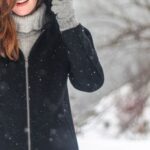 Coat - Woman Standing While Holding Her Jacket