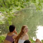 Foods - Group of Friends Resting on a Forest Park while Looking at the Scenery