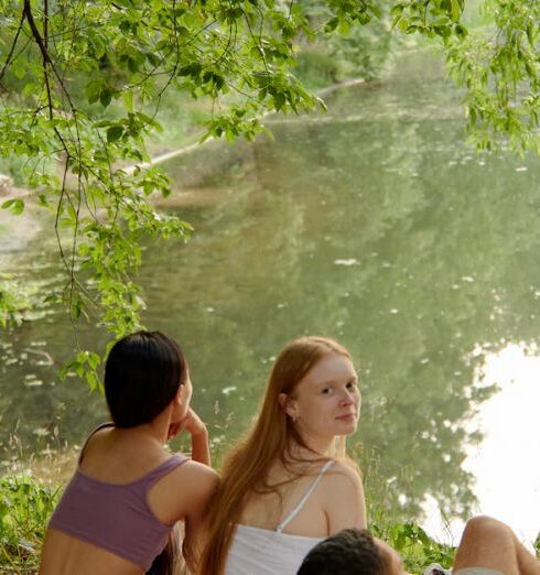 Foods - Group of Friends Resting on a Forest Park while Looking at the Scenery