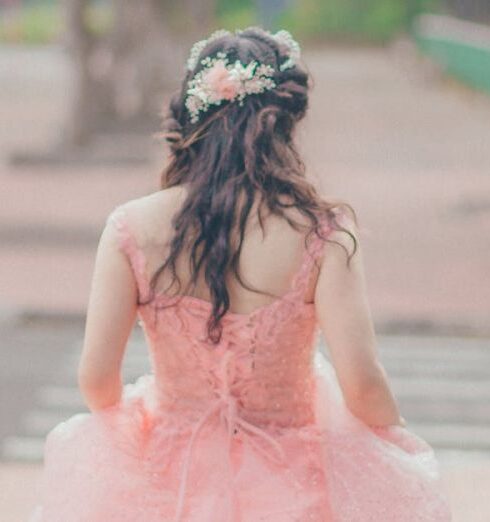 Gown - Woman Wearing Pink Floral Gown Stands Near Green Trees at Daytime