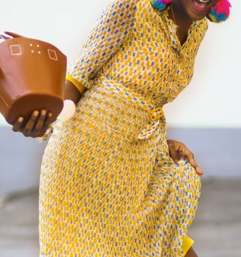 Dresses - Woman in Pink Dress Holding Brown Bag Standing