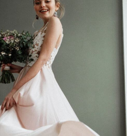 Dress - Woman Standing And Holding Bouquet