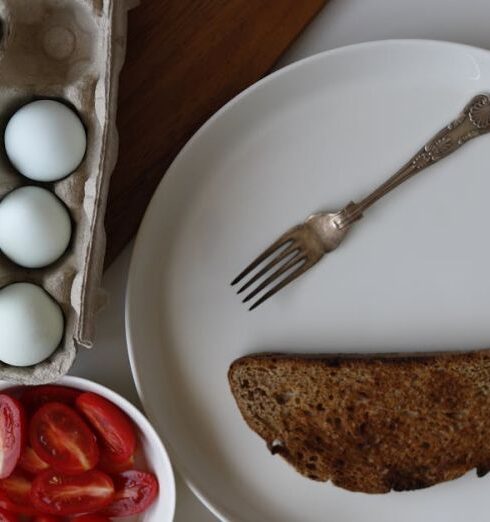 Healthy Eating - A plate of eggs, vegetables and a knife and fork