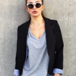 Blazer - Woman Wearing Sunglasses Leaning on Concrete Wall With Left Toe on Wall