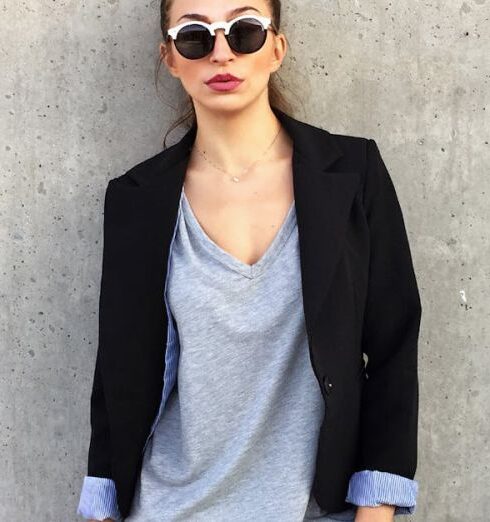 Blazer - Woman Wearing Sunglasses Leaning on Concrete Wall With Left Toe on Wall