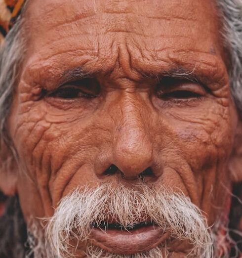 Attire - Elderly Man with Traditional Headwear