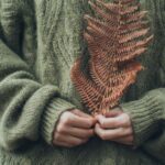 Knitwear - Woman Wearing Green Sweater Holding Dried Pine Leaf