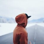 Hoodies - Man Wearing Brown Hoodie in Road