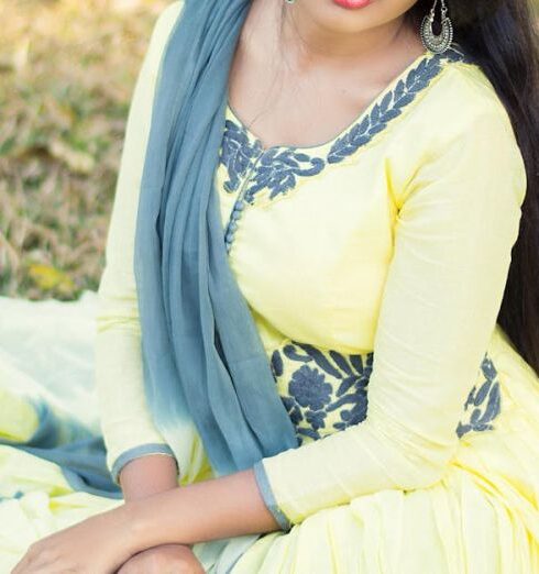 Dress - Selective Focus Photography of Woman Sitting on Green Grass