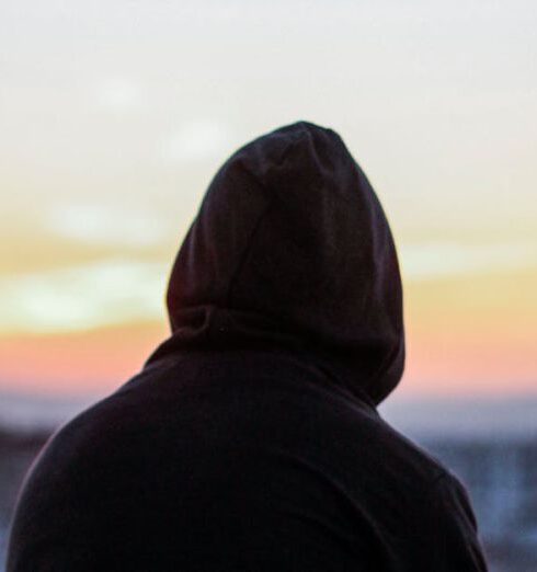 Hoodies - Man Sitting on Bench