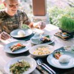 Meals - Man and Woman by Table