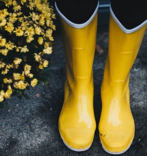 Boots - Photo of Yellow Boots Near Flowers