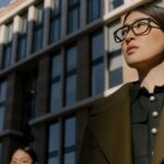 Coats - Woman in Brown Coat Standing Near Building