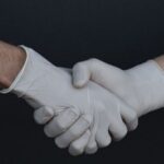 Gloves - People Shaking Hands in Latex Gloves