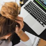 Stress Management - Woman Sitting in Front of Macbook