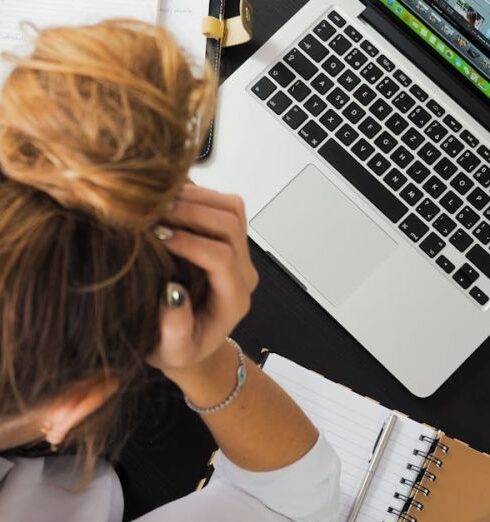 Stress Management - Woman Sitting in Front of Macbook